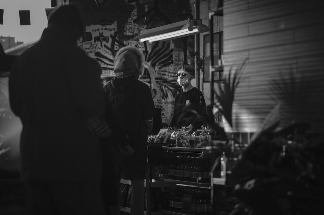 store detective watching shopper